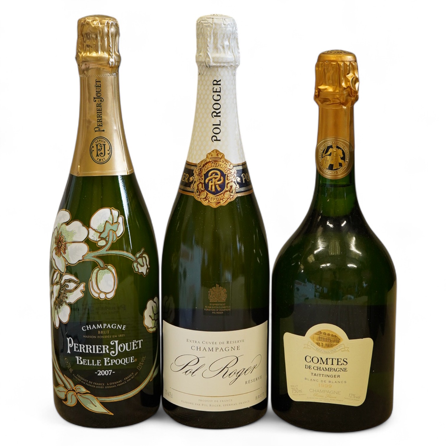 A bottle of 2007 Perrier - Jouet Belle Epoque Champagne, a bottle of Taittinger Comtes Champagne and a bottle of Pol Roger Extra Cuvee Reserve Champagne (3)